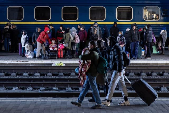 People waiting for trains at Kyiv station as they flee the conflict in Ukraine. Photo: Getty Images