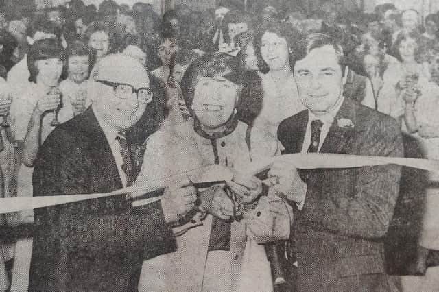 Dr Alan Barlow (left) and David Stocks (right) help actress Kathy Staff cut the ribbon to mark the official opening of Kirkwood Hospice on March 5, 1987