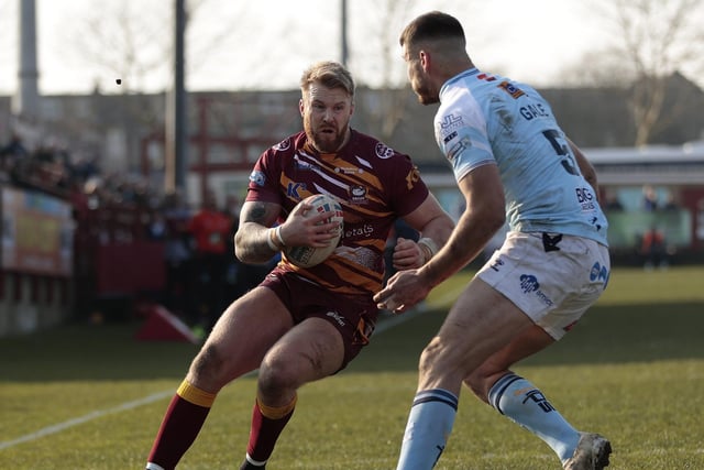 Batley's Perry Whiteley takes on his opposing wingman Gareth Gale. Picture: Neville Wright