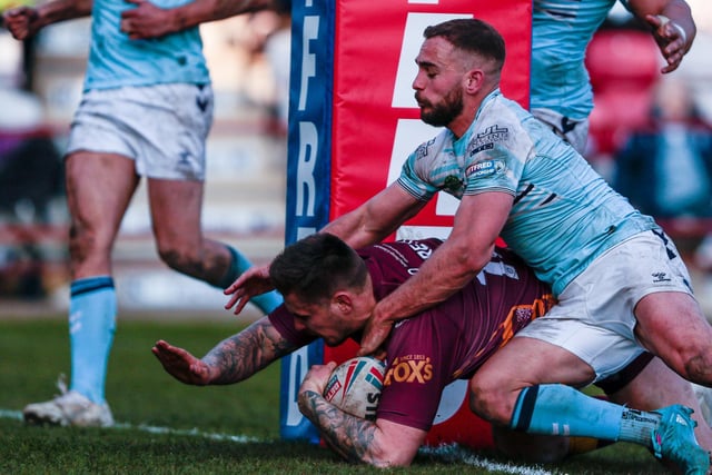 Toby Everett goes over under the sticks for a Batley try. Picture: Neville Wright