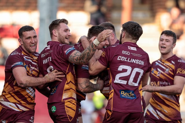 Batley players celebrate Toby Everett's try. Picture: Neville Wright
