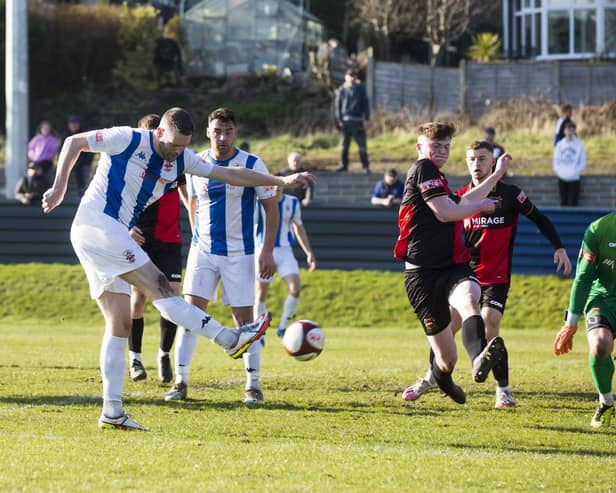 Gav Allott gets a shot away and was one of the scorers as Liversedge FC beat Sheffield FC 3-2. Picture: Jim Fitton