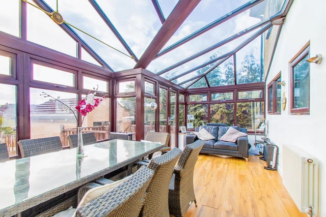 This adaptable sun room can be arranged to suit a variety of uses.