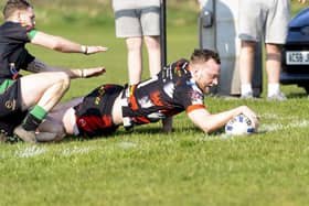 Jack Raby dives over for one of his two tries for Eastmoor Dragons against Shaw Cross Sharks. Picture: Scott Merrylees