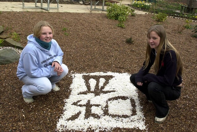 Leanne McGuire and Becky Norman in the Japanese garden built by pupils at Earlsheaton High School.