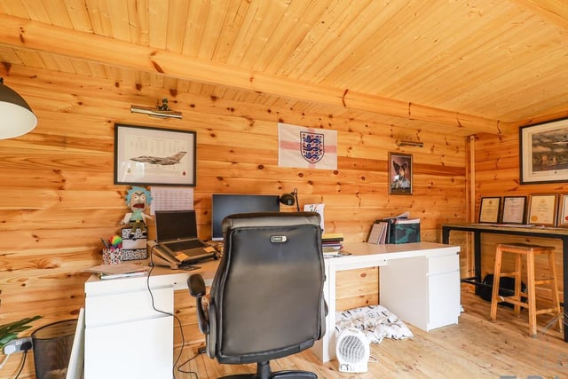 The log cabin is perfect for use as an office or studio.