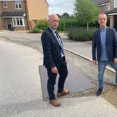 Dewsbury MP Mark Eastwood and community campaigner Keith Mallinson, who have both raised concerns about the state of the Harron Homes development at Amberwood Chase in Dewsbury