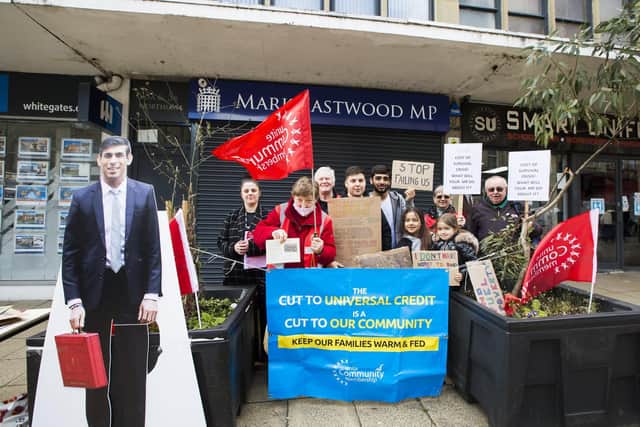 The protest was held on Saturday, April 9, outside MP Mark Eastwood's office.