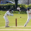 Methley wicketkeeper Alex Cree is ready and waiting as Cleckheaton's Ian Carradice faces this delivery in the opening game of the new season. Picture: Scott Merrylees