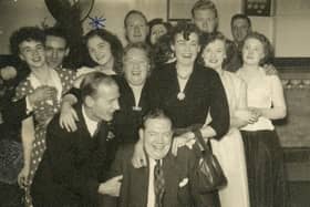 MOVIE NIGHT: A happy group of staff who worked at the Playhouse in the 1950s at their Christmas party