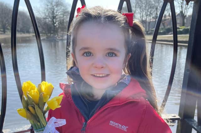 Isabel Thornhill who found a bunch of daffodils at the park