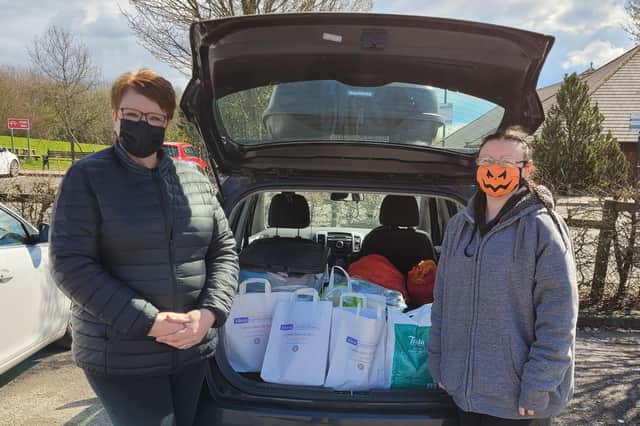 Nicola Sutton, left, front of house manager at Lydgate Lodge care home in Batley, and Lauren Simmonds-Hill, of the ‘Driving supplies to Poland for Ukraine refugees’ Facebook group