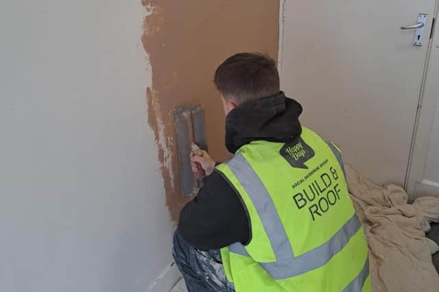 19-year-old Calium is among the Happy Days apprentices who worked on renovating the former housing office in Chickenley to provide flats for council tenants