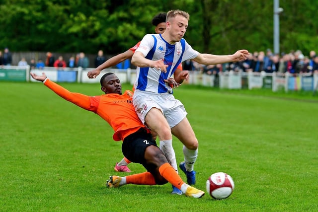 Mohammed Ibrahim tackles Lewis Whitham