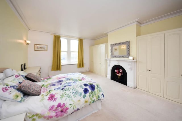This double bedroom has a Victorian style fireplace and again, benefits from light pouring through the sizeable windows.