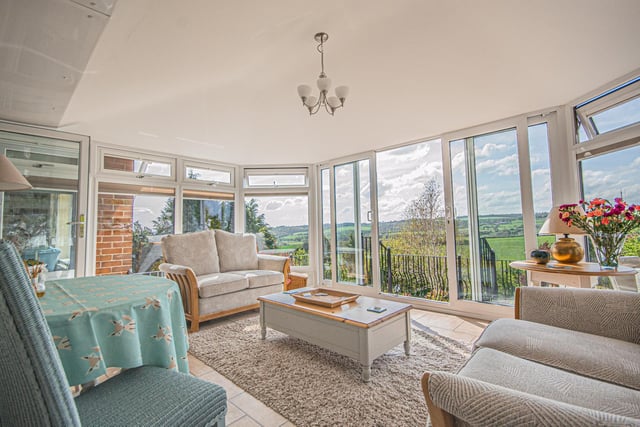 This conservatory is a perfect place to sit back and enjoy the extensive views.