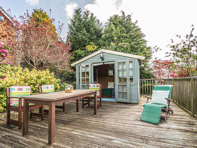 A great garden facility with decking for table and chairs, or entertaining.