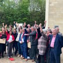 Labour members and councillors celebrate winning a majority on Kirklees Council at last week's elections