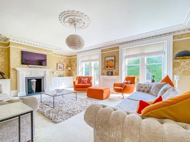 Light floods in to this stunning room through its full height sash windows. An original ceiling rose and coving are features.