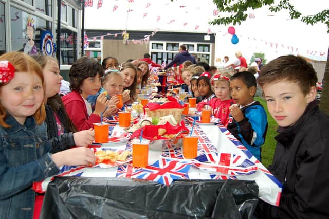Pupils at Crossley Fields Junior School tucked into a huge alfresco lunch to celebrate the Diamond Jubilee.