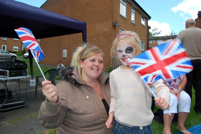 Wroe Street, Dewsbury, Jenny Fearnley gets in the party mood with daughter Phoebe.