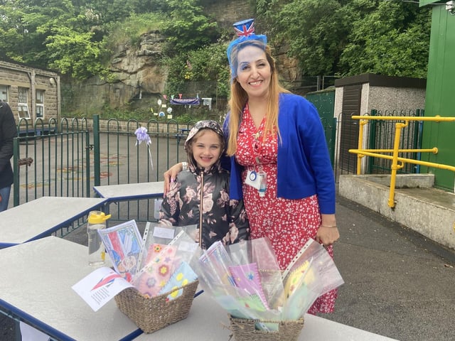 Maddison Steinke and teacher Mrs Daftar at Hanging Heaton Junior and Infant School