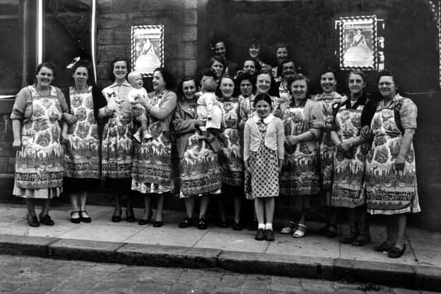 This was one street party which was actually held in a pub in Westtown - The Star Hotel - and the ladies who organised it were members of St Paulinus Church. They were so determined to show their loyalty to the new Queen they had photographs of her displayed outside the pub. One of the organisers, Mrs Rose Hodge, is pictured fifth from left holding her baby daughter