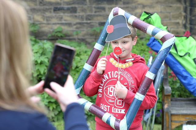 Joe, aged 10, takes a selfie in the selfie booth at St Andrew's Church, Oakenshaw, at the Oakenshaw Community Big Jubilee Lunch