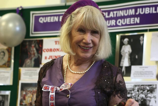 Friends of Cleckheaton Library volunteer Caz Goodwill dressed in 1950s clothing to celebrate the Queen's Platinum Jubilee