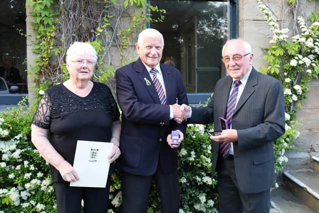Arthur Aveyard was presented with an FA 50-Year Service Award.by Barry Chaplin, chairman of the West Riding County FA.