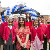 Healey Junior, Infant and Nursery School in Batley has been rated 'good' in all areas by Ofsted. Pictured is head teacher Luisa Lang with pupils