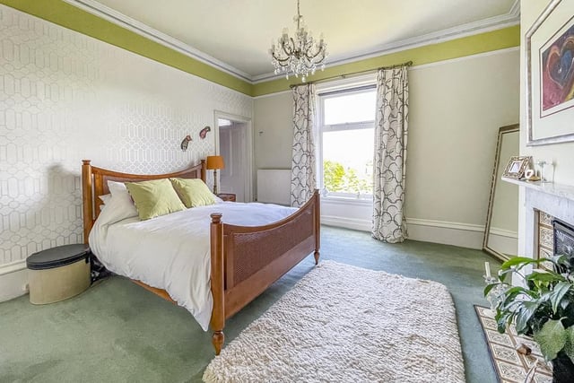 One of the property's spacious bedrooms, all of which have good sized windows.