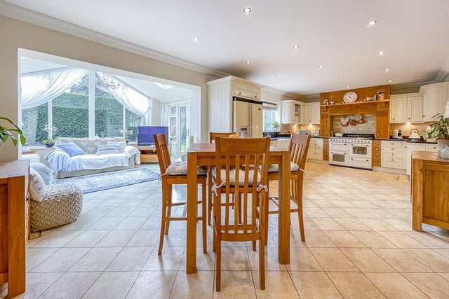 The kitchen with dining space and family living area is light and spacious.