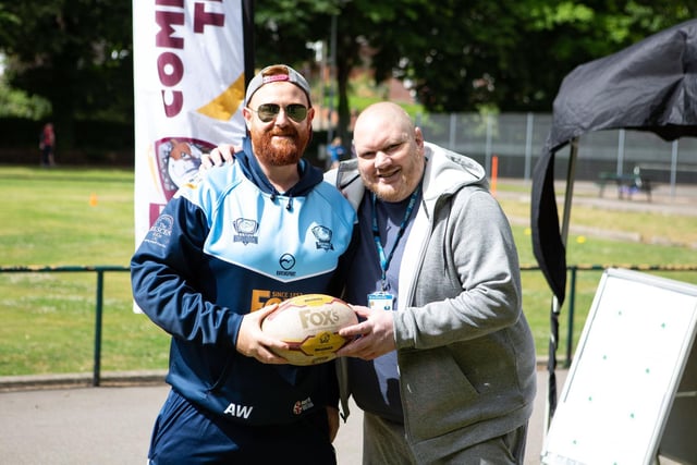 Batley Bulldogs community coach Andy Walker with Peter Roebuck at the Great Get Together in Wilton Park, Batley