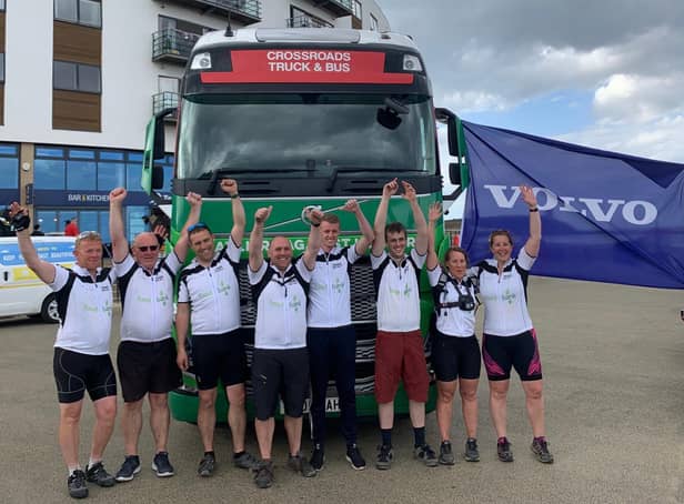 Staff from Crossroad Truck and Bus in Birstall before the coast-to-coast ride