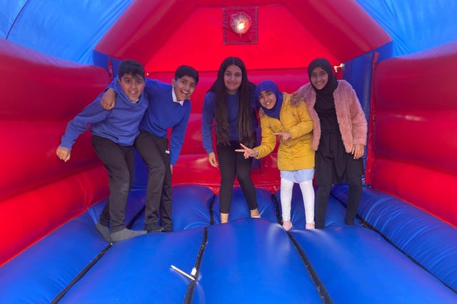 Pupils from Boothroyd Primary Academy enjoying the bouncy castle.