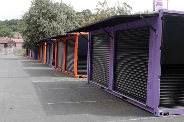 Shipping containers that cost £800,000 sitting in a Dewsbury car park