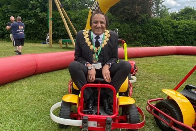 Mayor of Kirklees, Coun Masood Ahmed, enjoying the go-karts.
