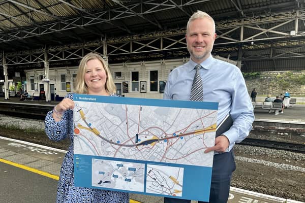Neil Holm (right), Transpennine Route Upgrade director, with Hannah Lomas (left), principal programme sponsor, at Huddersfield Station