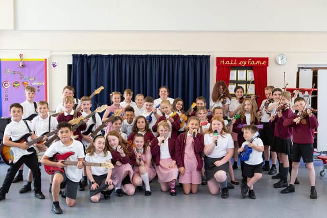 Children from Thornhill Junior and Infant School’s Rock School travelled to Birmingham Symphony Hall to perform in front of a live audience and music mentors as part of the Music for Youth National Festival
