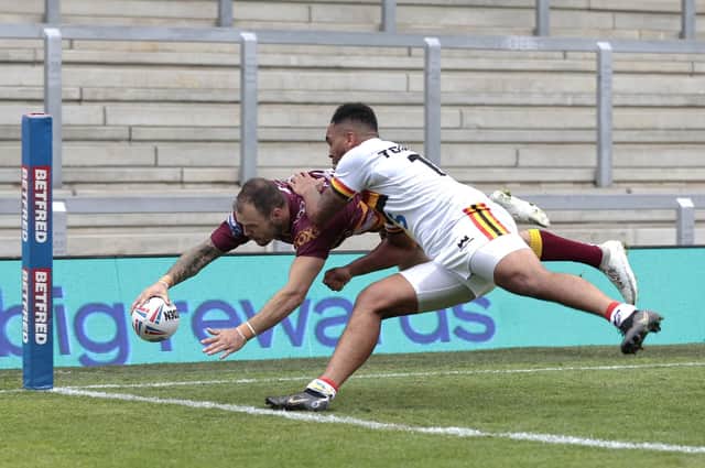 Dale Morton scores a try for Batley against Dewsbury at the Summer Bash at Headingley on Saturday. Photos by Neville Wright