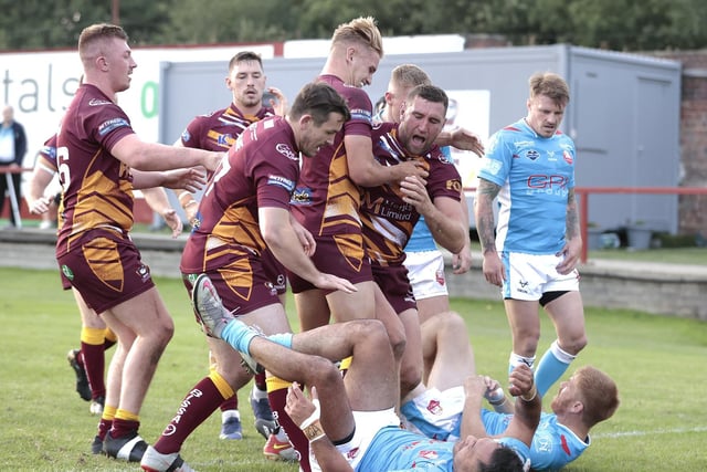 Batley players celebrate a try