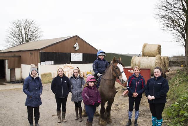 Instructors and riders at Batley Hall Farm Riding Centre. From the left, Loren Gaskin, Debbie Gaskin, Laila Gaskin, Ruby Ward, 11, Lilly Ward, nine, on Henry, Heather Taylor and Vicky Hathaway.