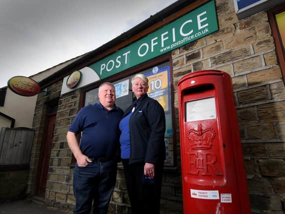 Alison Hall with her husband Richard, pictured outside the Post Office on Halifax Road, Liversedge