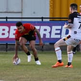 TRY TIME: Andy Gabriel touches down for Dewsbury Rams during their defeat against Bradford Bulls on Sunday - their first loss of the league season. Picture: Thomas Fynn