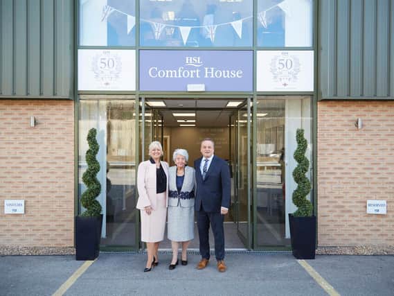 Pictured from the left are Debra Burrows (William Burrows' wife), Patricia Burrows (founder of HSL) and William Burrows (chairman and owner of HSL) in front of HSL headquarters in Batley