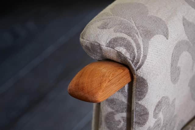The wooden knuckle armchair handle