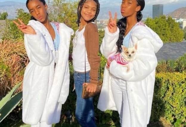 Daughters of P Diddy (Sean Combs) twins Jessie and D’Lila in coats from House of Juniors