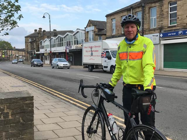 Coun Martyn Bolt at the start of his bike ride from Mirfield to Huddersfield to highlight the need for road repairs