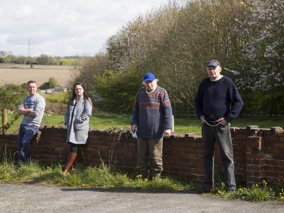 Pictured from the left are Shane Shaw, Sarah Gomersall, Rodney Lyles and Steve Crossley, who are objecting to the plan near their homes in Hanging Heaton